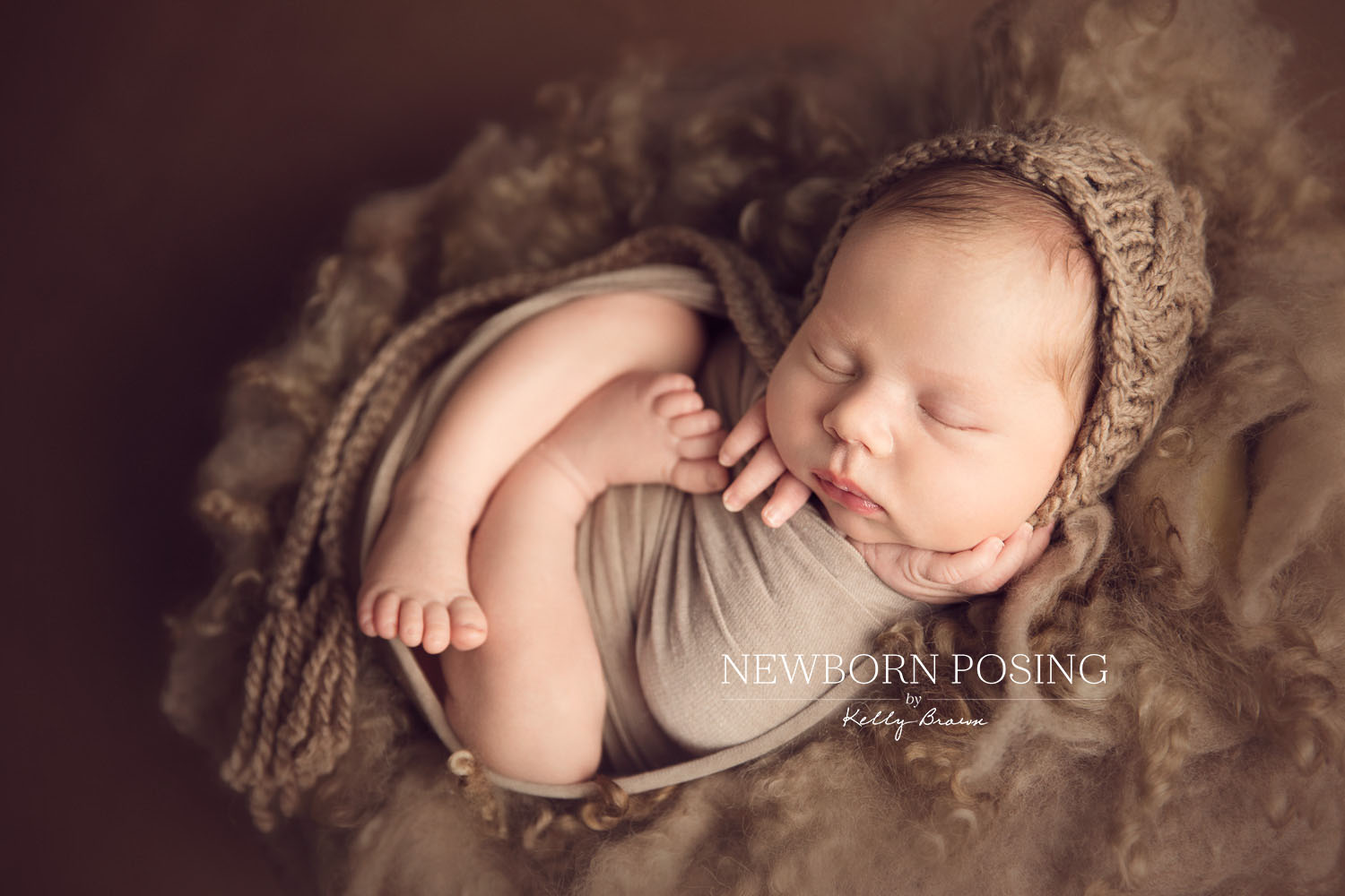 Newborn photography of baby with a beanie