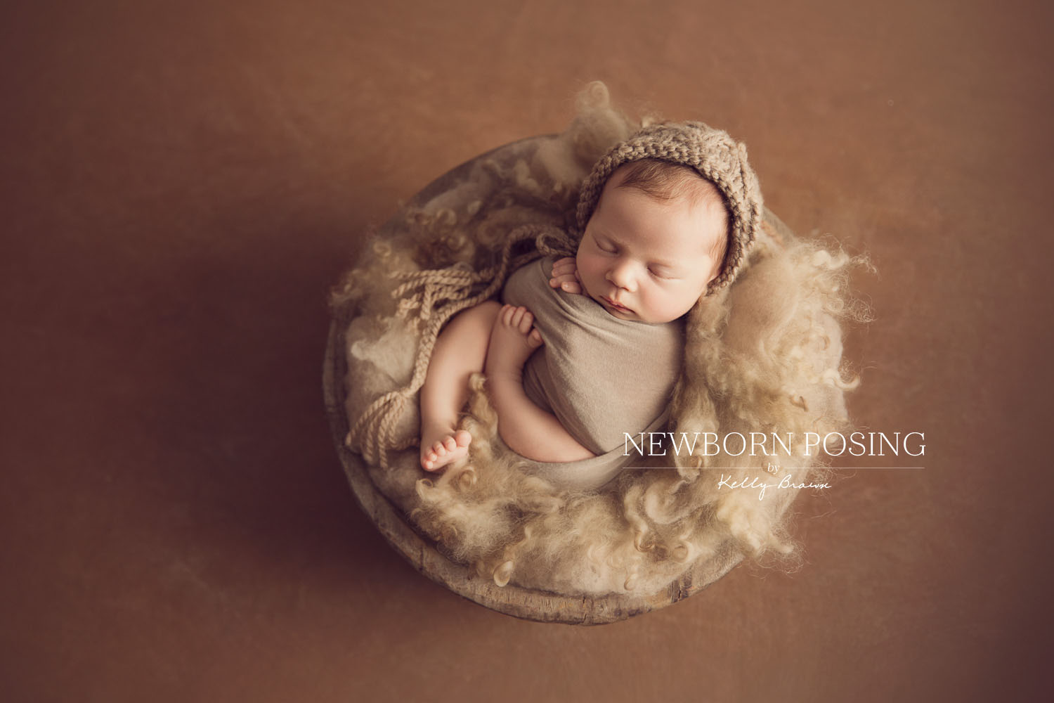 Newborn photography of baby in a prop
