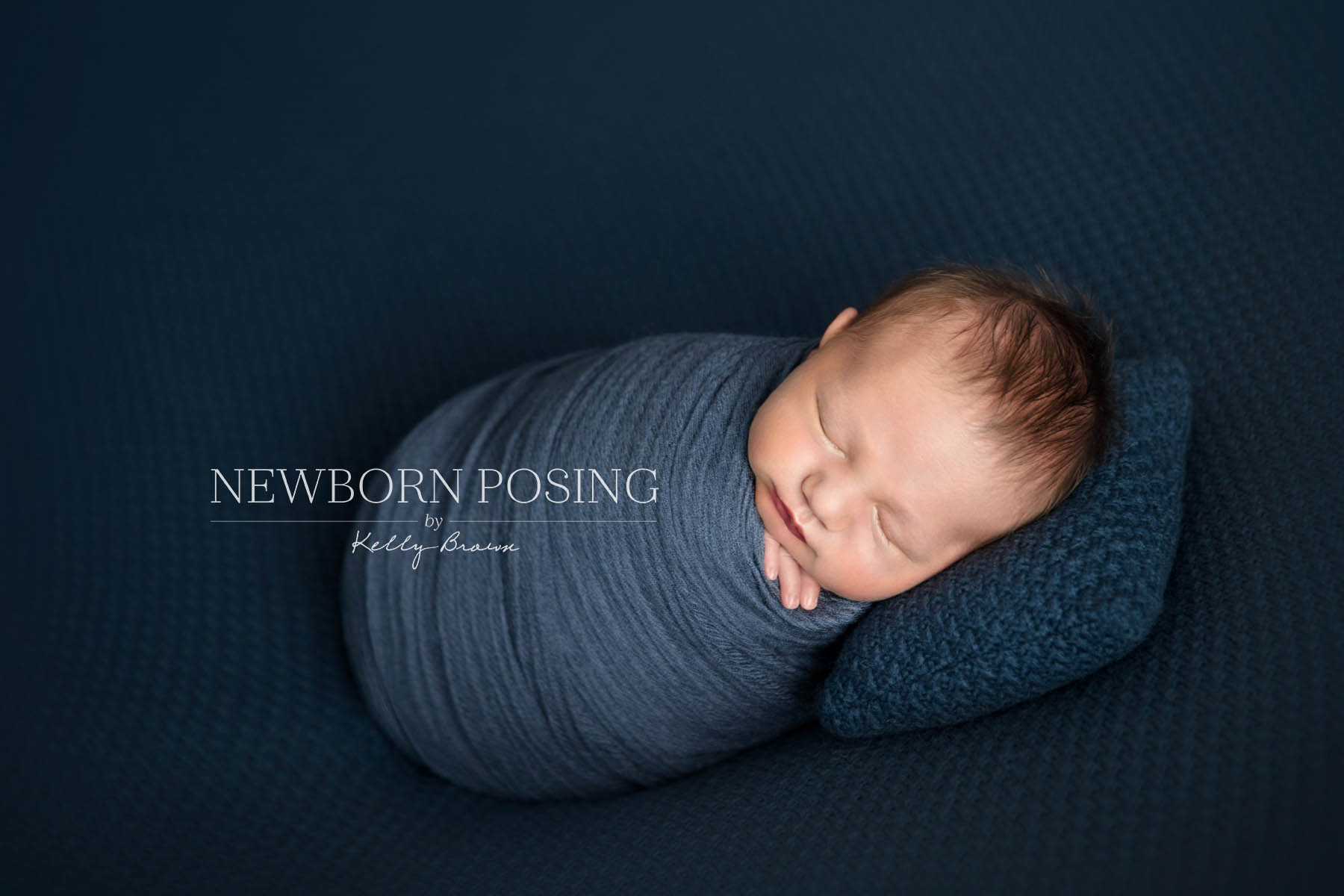 Newborn photography of baby lying on their side