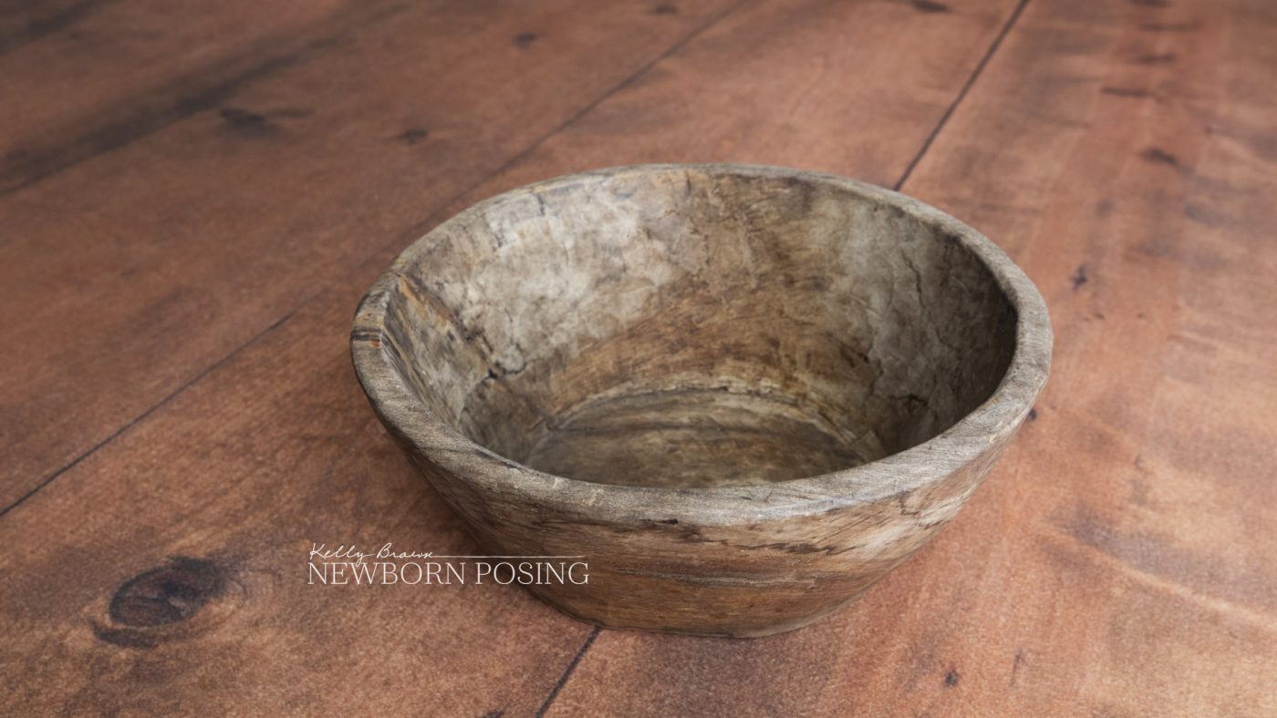 wooden bowl - newborn posing - kelly brown